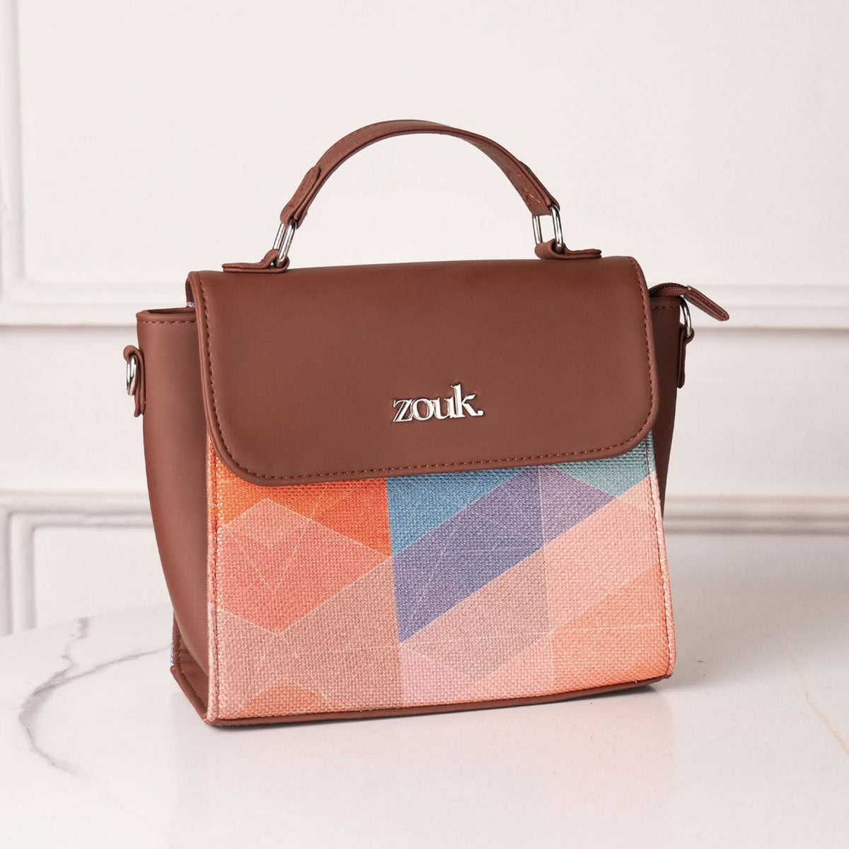GeoOptics Statement Sling Bag
