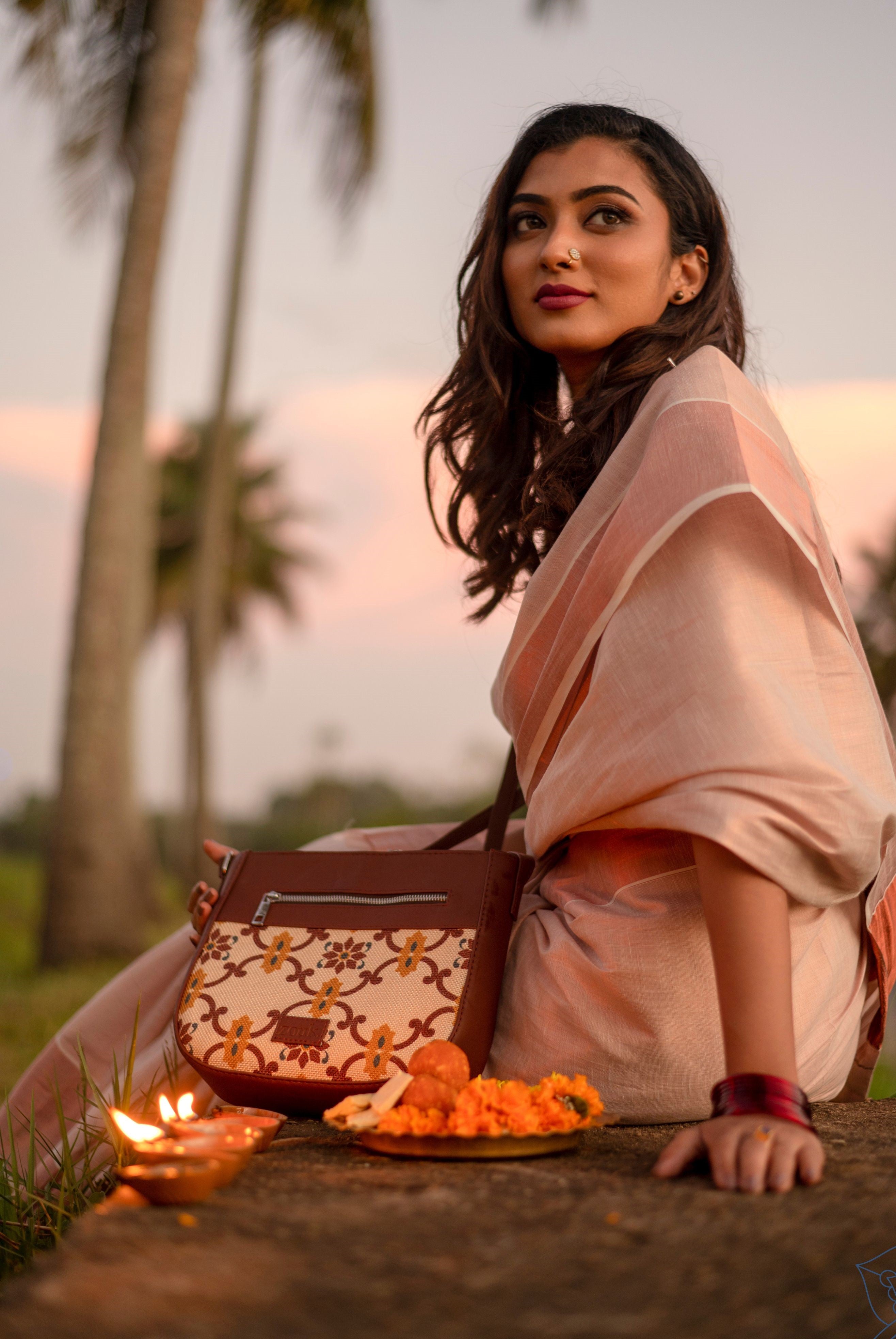 Sabyasachi - The Sabyasachi Autumn/Winter 2021 Collection Womenswear,  jewellery @sabyasachijewelry and accessories @sabyasachiaccessories  Disclaimer: The Tropical Sling bag featured in the image has been made  using faux fur. At Sabyasachi, we do