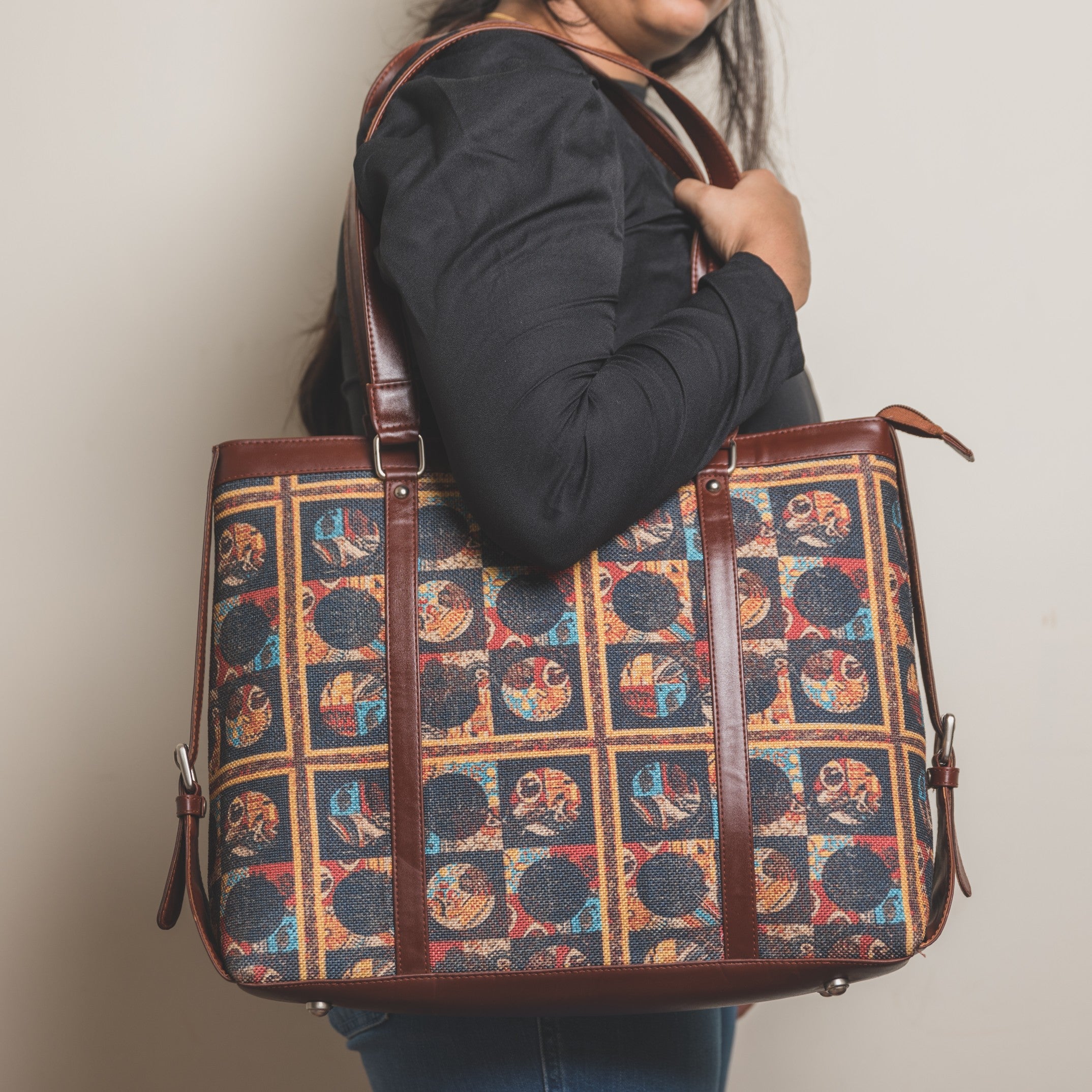 Zouk African Art Women's Office Bag - Model carrying the bag in shoulder image