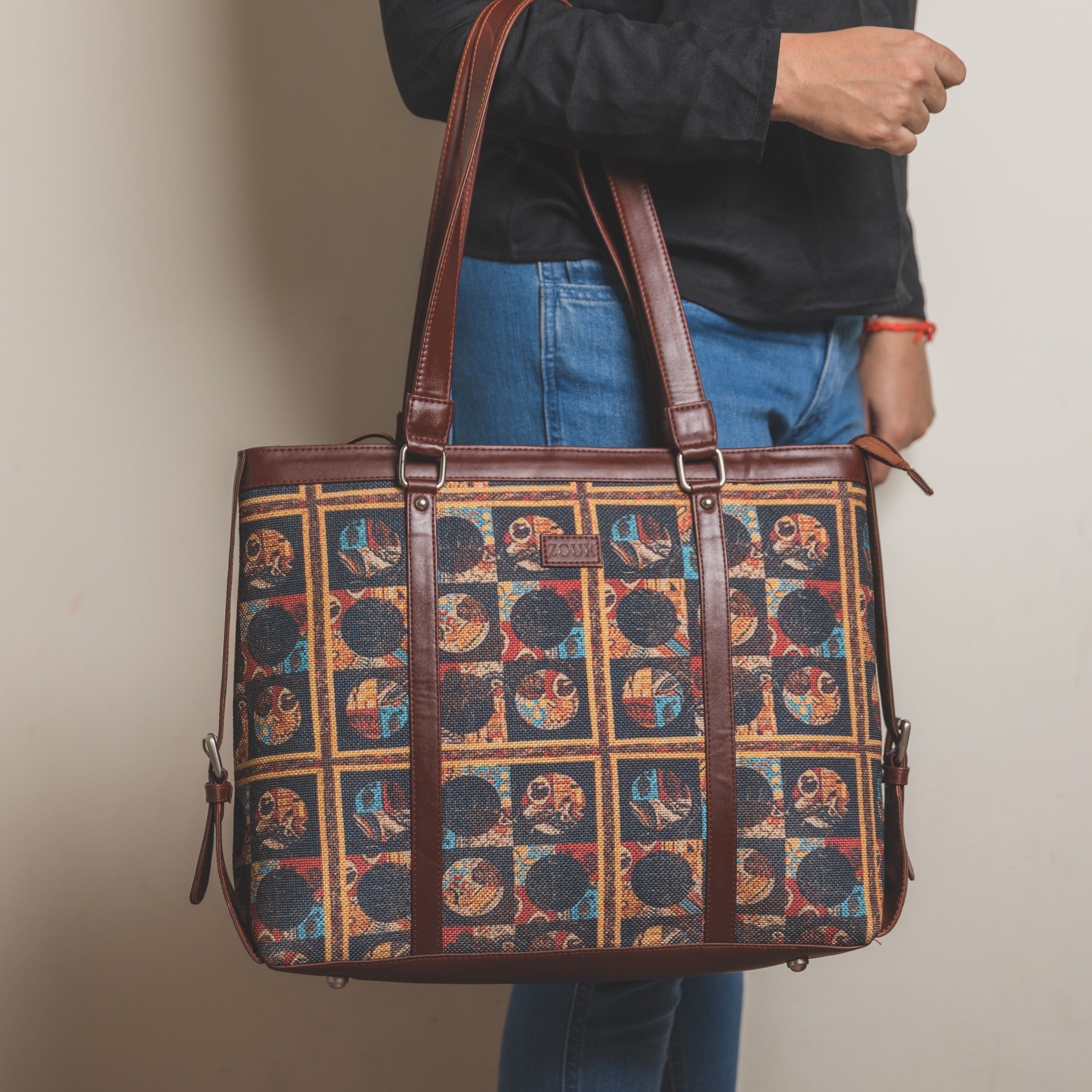 Zouk African Art Women's Office Bag - Model holding the bag in hand view